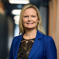 Line Færch Milthers | CEO of Conscensia Line Færch Milthers, CEO of Conscensia, wearing a blue blazer.
